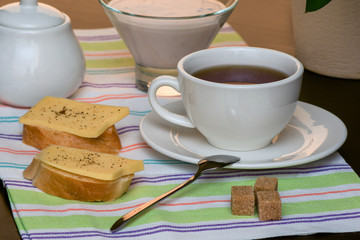 morning cozy Breakfast with a Cup of cocoa and sandwiches with cheese