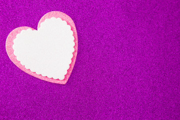 Obraz premium Simple Background with a Glittery Love Heart Pefect for Adding a Message of Devoation