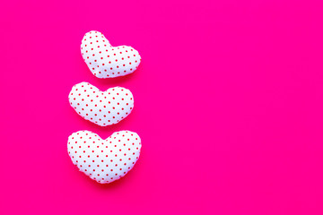 Valentine's hearts on pink background