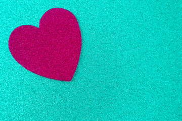 Obraz premium Simple Background with a Glittery Love Heart Pefect for Adding a Message of Devoation