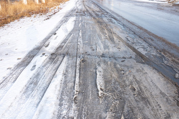 Fototapeta premium dirty snowy streets of the city