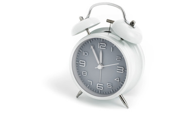 Twin bells analogue alarm clock shows time 5 to 12 with gray clock face, 11.55 AM PM, on white...