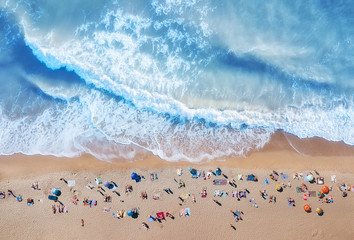 Aerial view at the beach. Turquoise water background from top view. Summer seascape from air. Top...