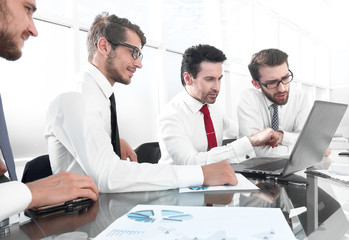 Fototapeta premium business people working and communicating while sitting at the office desk
