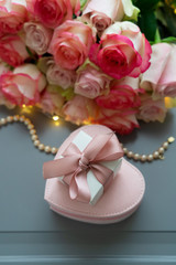 fresh rose flowers on gray