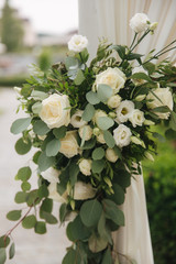 Flowers on wedding decor, green and white color