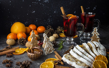 Traditional stollen and milled Hot wine cake and Christmas decorations