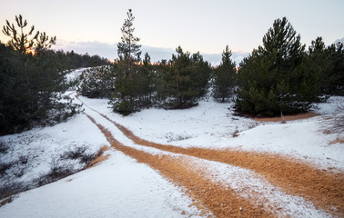 ATV auto sport track at winter. Wheel sandy tracks on snow