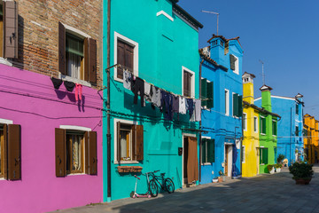 Fototapeta na wymiar Colorful street of Burano island, Italy