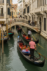 Fototapeta na wymiar Venice gondolas under the bridge