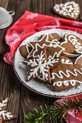 Christmas homemade gingerbread cookies on wooden background. New year and christmas postcard