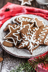 Christmas homemade gingerbread cookies on wooden background. New year and christmas postcard