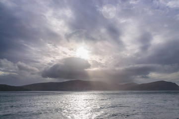 The coast of the Falkland islands, around sunrise, as seen from an Antarctic expediction ship.
