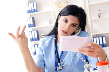 Female doctor cardiologist working in the clinic