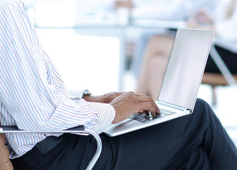 closeup.businessman working on laptop with new data
