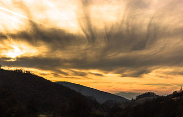 Dramatic sky with clouds at sunset