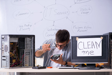 Young it specialist in front of the whiteboard 