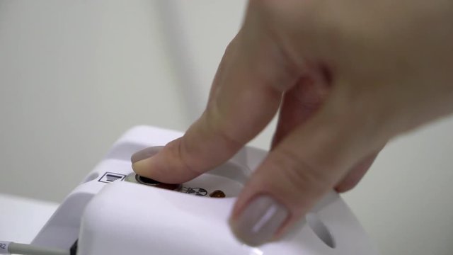 X-ray medical cabinet in hospital. Work place of doctor in clinic. Healthcare. Radiology button red pushing by doctor