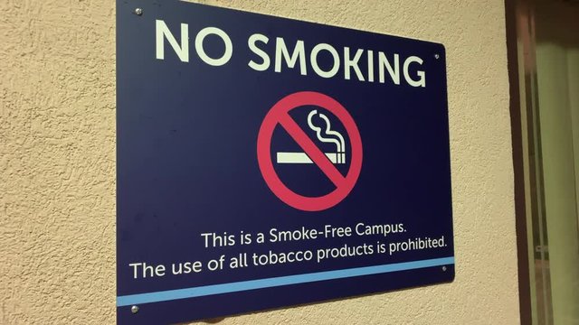 No Smoking sign on outside of hospital entrance