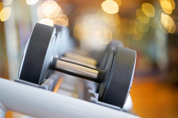 Close-up rows of dumbbells in the gym