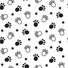 Fototapeta premium Paws seamless vector pattern. Animal tracks black and white background.