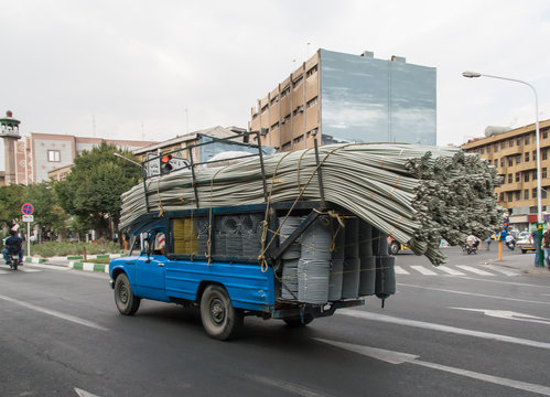 Overloaded truck with tubes