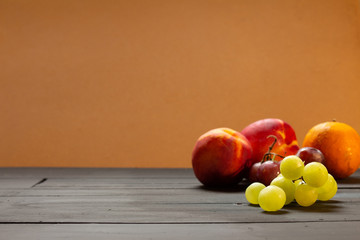 Group of fruits on a rustic background.