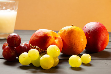 Group of fruits on a rustic background.