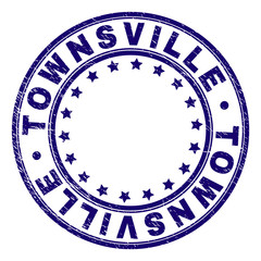 TOWNSVILLE stamp seal watermark with grunge texture. Designed with circles and stars. Blue vector rubber print of TOWNSVILLE title with unclean texture.