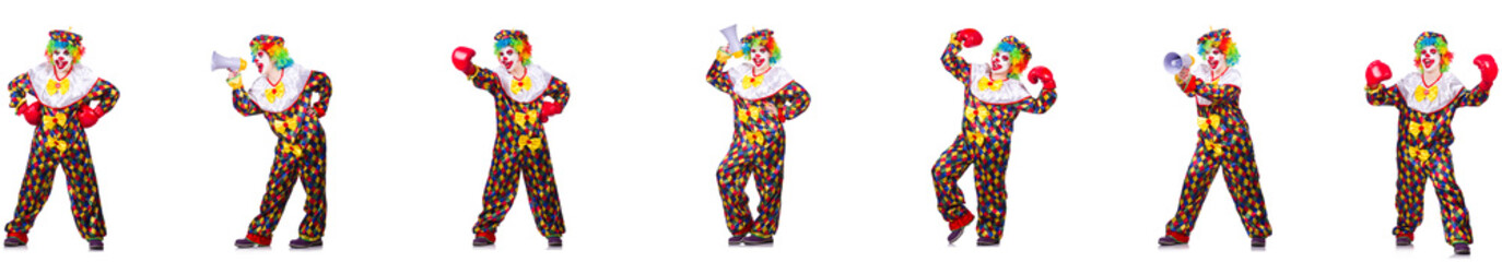 Funny male clown with boxing gloves and loudspeaker 
