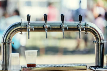 Fotobehang Close-up of craft beer taps © simonmayer
