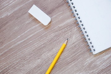 Note and pencil on the desk.  机の上のノートと鉛筆