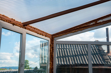 Glass roof in greenhouse at cottage