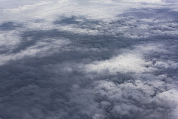 Obraz na płótnie Canvas cloud and sky view from window of airplane