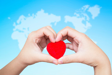 World Health Concept: Holding Red Love