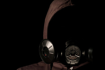Obraz na płótnie Canvas Gas mask on a black background.