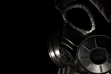 Gas mask on a black background.