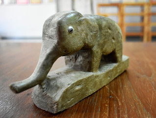 The elephant carved from wood is a sacred thing.