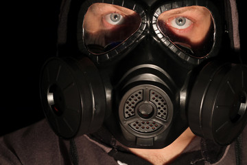 Gas mask on a black background.