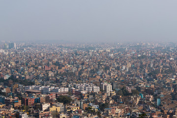 Fototapeta na wymiar Wide cityscape view of Kathmandu, Nepal on the day time.