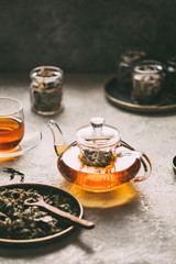 Glass teapot of freshly made herbal tea.