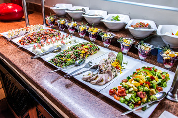 Assortment fresh vegetable salads vegetarian buffet tasty side dish variety. Healthy food set,...