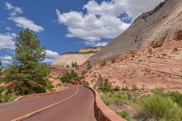 Zion - Mount Carmel Highway passing sandstone mesas and white cliffs of Zion National Park, Utah