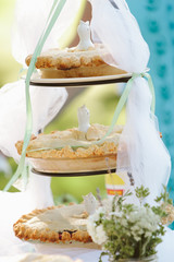three pies sitting on a rack for a wedding © maxwellmonty