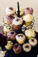 wedding cupcakes on a rack