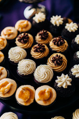 wedding cupcakes on a rack