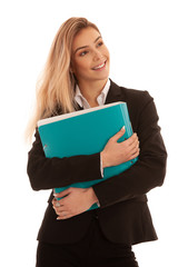 Beautiful young business woman in black suit holds business file folder isolated over white