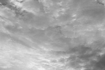 black and white sky with white and gray clouds 