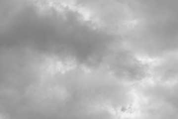 black and white sky with white and gray clouds 