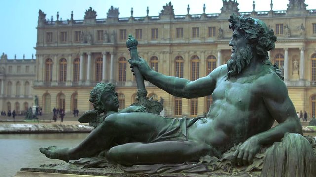 Versailles, Paris, France-The sculptures were designed and directed by Charles Le Brun: each pool is decorated with four reclining statues symbolising the rivers of France